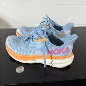 Women’s HOKA Clifton 9 Vibrant Blue and Orange Sneakers